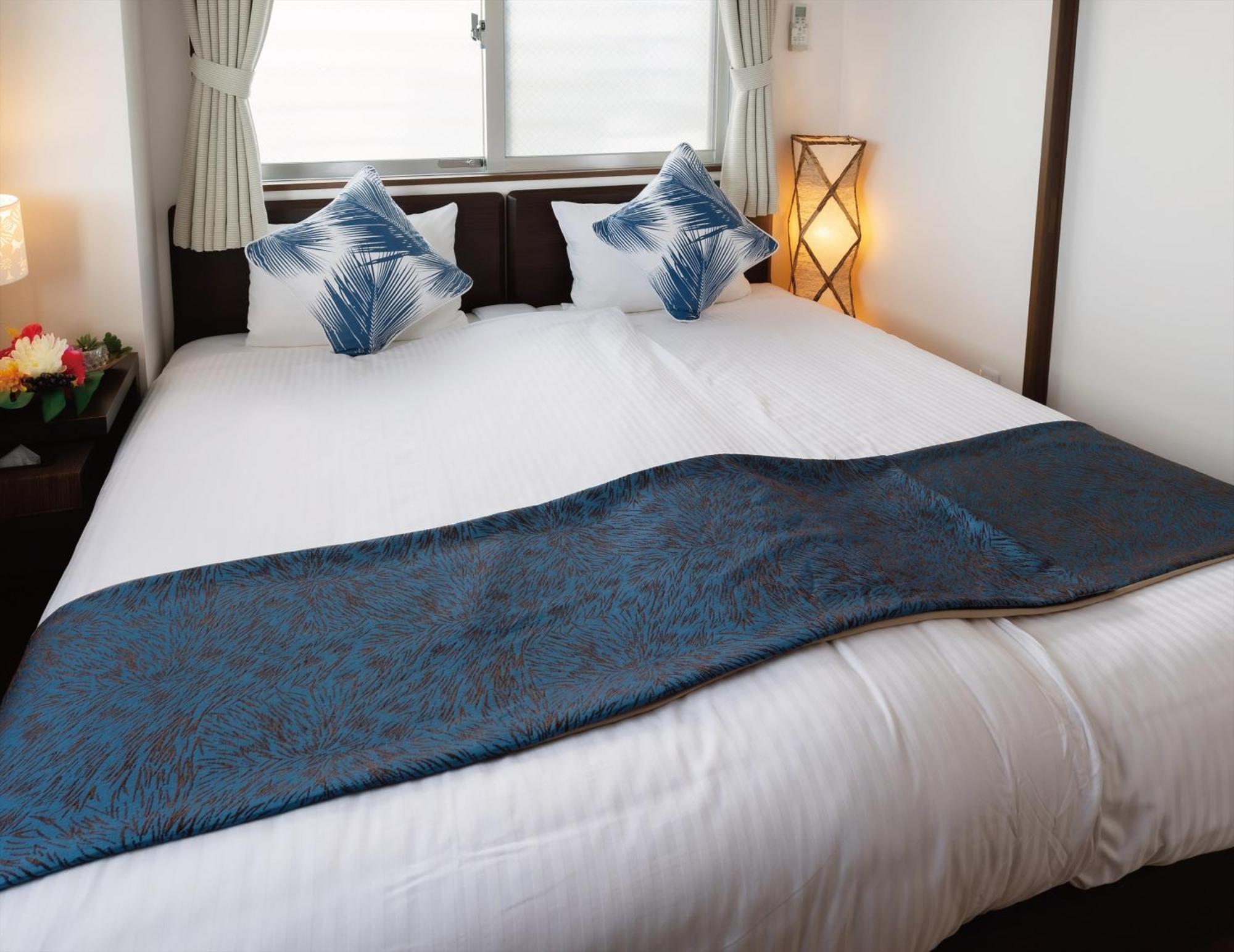 Zoe Resort The Sunset Village Okinawa Тятан Номер фото