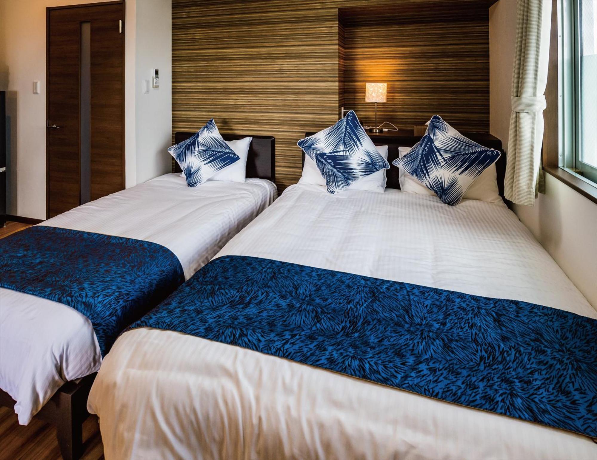 Zoe Resort The Sunset Village Okinawa Тятан Номер фото