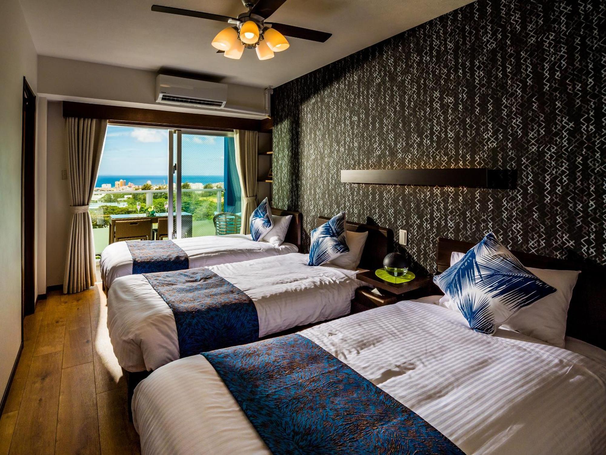 Zoe Resort The Sunset Village Okinawa Тятан Экстерьер фото