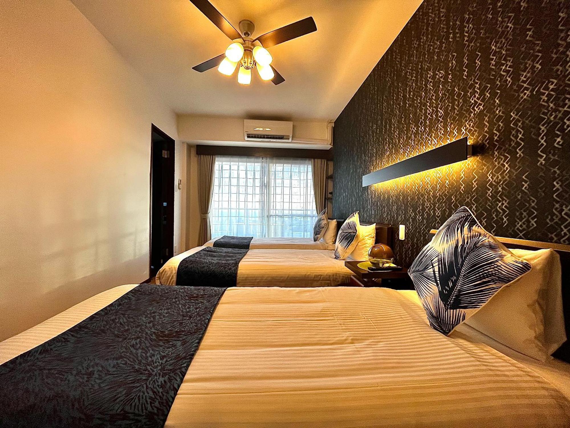 Zoe Resort The Sunset Village Okinawa Тятан Экстерьер фото